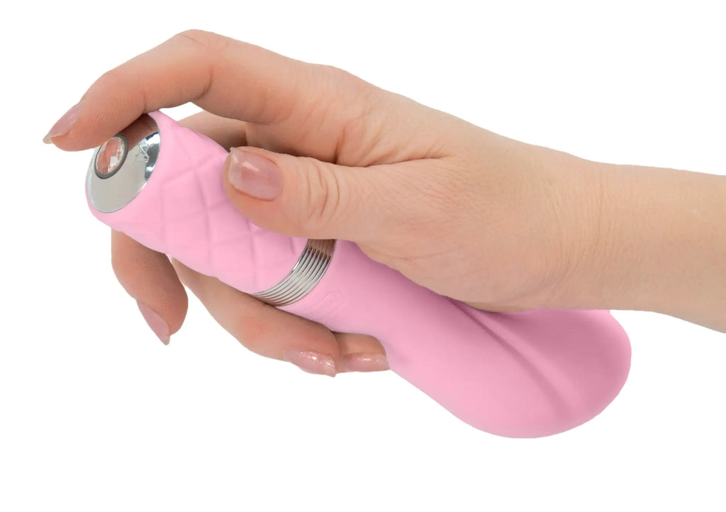 Pink silicone vibratory wand pillow talk sassy pink with silver metallic accents and circular button on top
