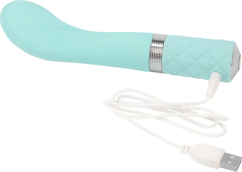A sleek light blue silicone vibrator with textured grip and silver band from pillow talk sassy teal collection