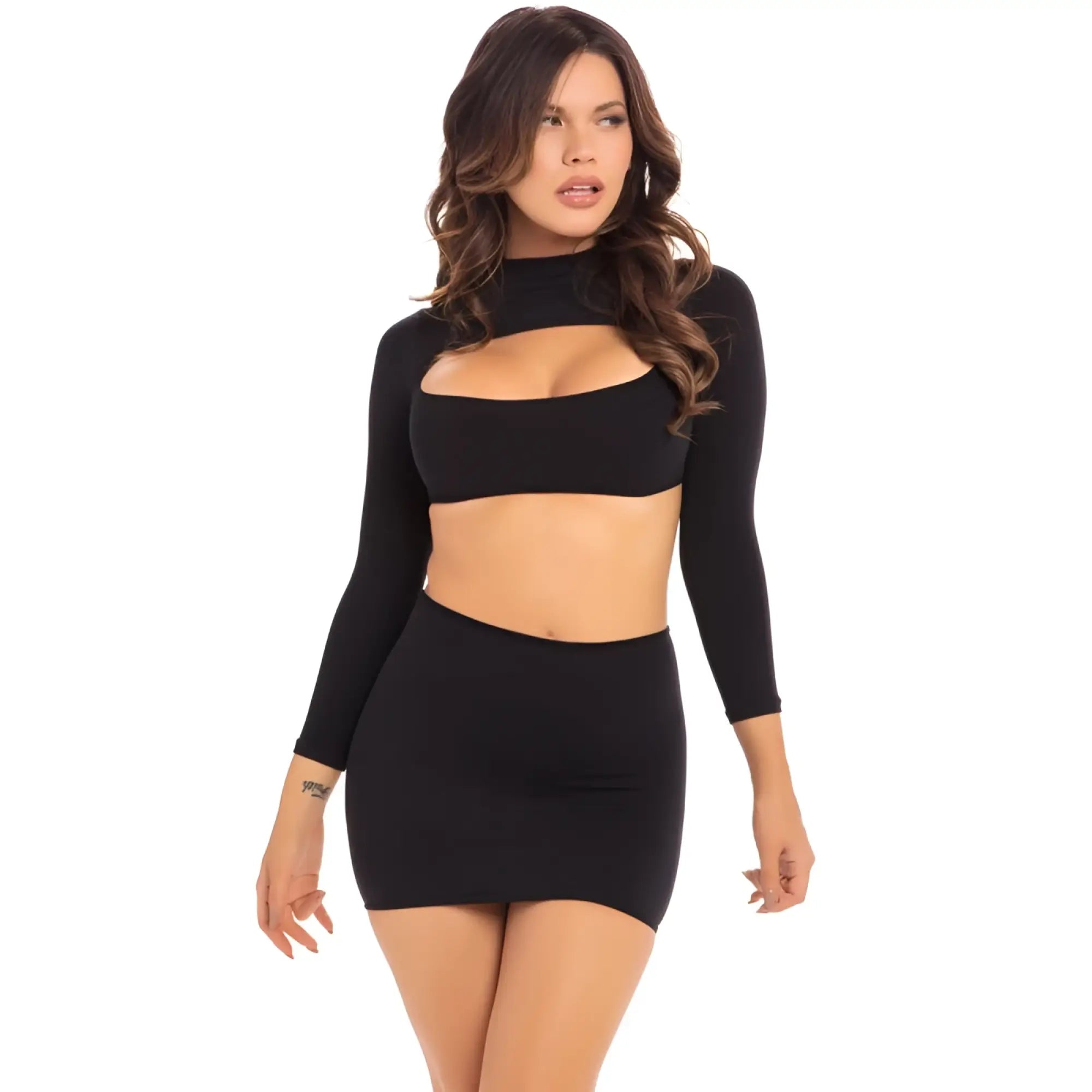 Black long-sleeved crop top with high neckline and cutout detail paired with matching mini skirt pink lipstick medium large