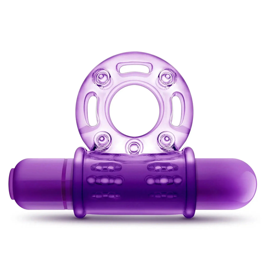 Purple silicone vibrating cock ring with textured grip and circular head featuring multiple small protrusions.