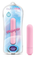 Pink cylindrical vibrator in clear plastic packaging with cutey vibe plus branding and blush novelties logo