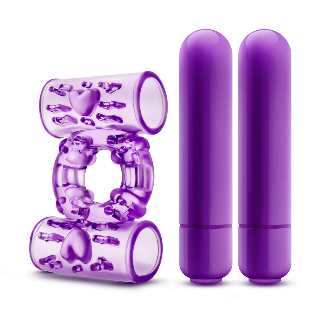 Purple silicone play with me double play dual vibrating cock ring set featuring textured transparent ring and two vibrators