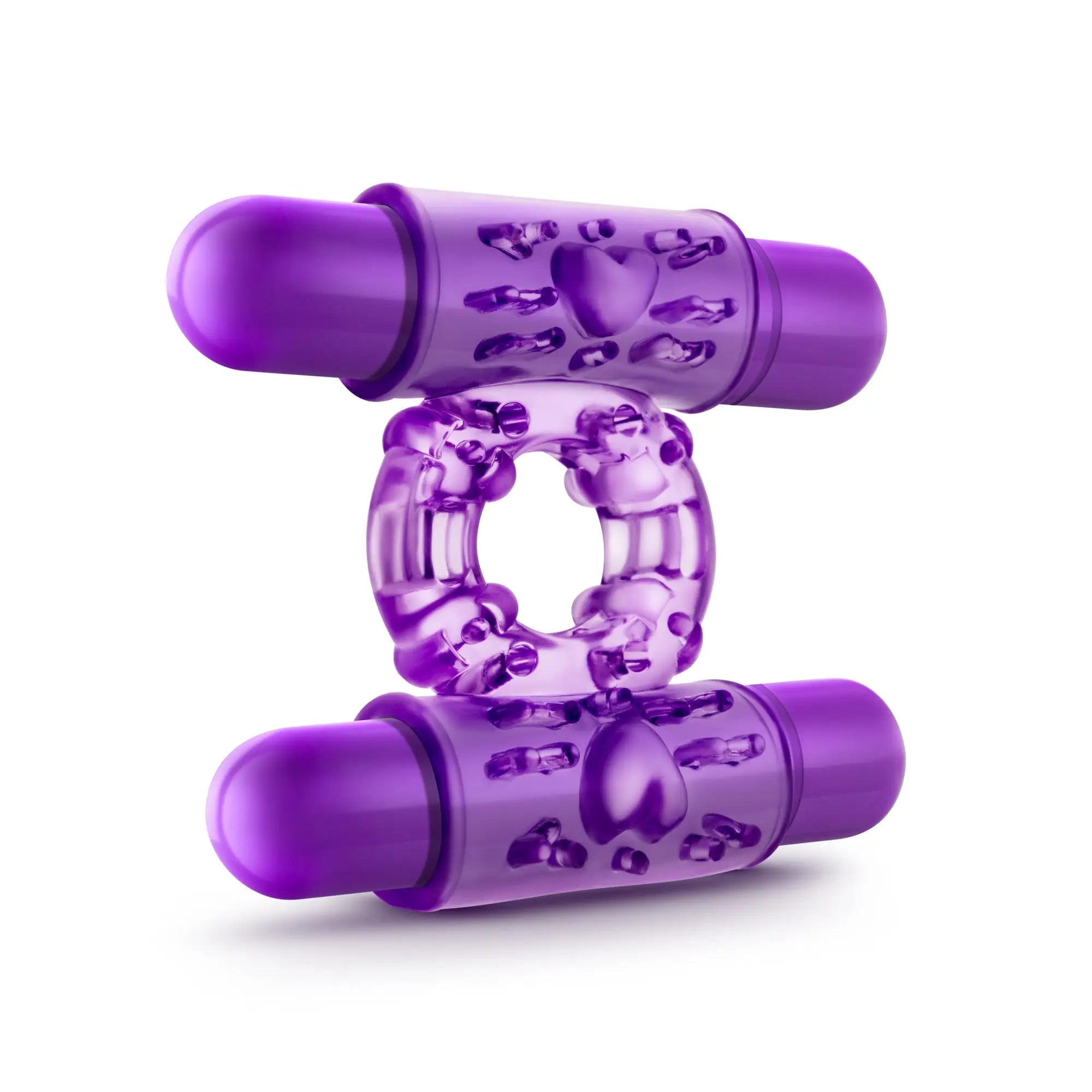 Purple translucent silicone dual vibrator with heart-shaped embossed details and rounded cylindrical ends