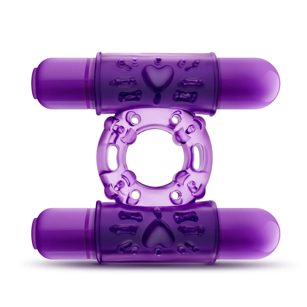 Purple translucent silicone double vibrating cock ring with embossed heart and bone designs from play with me