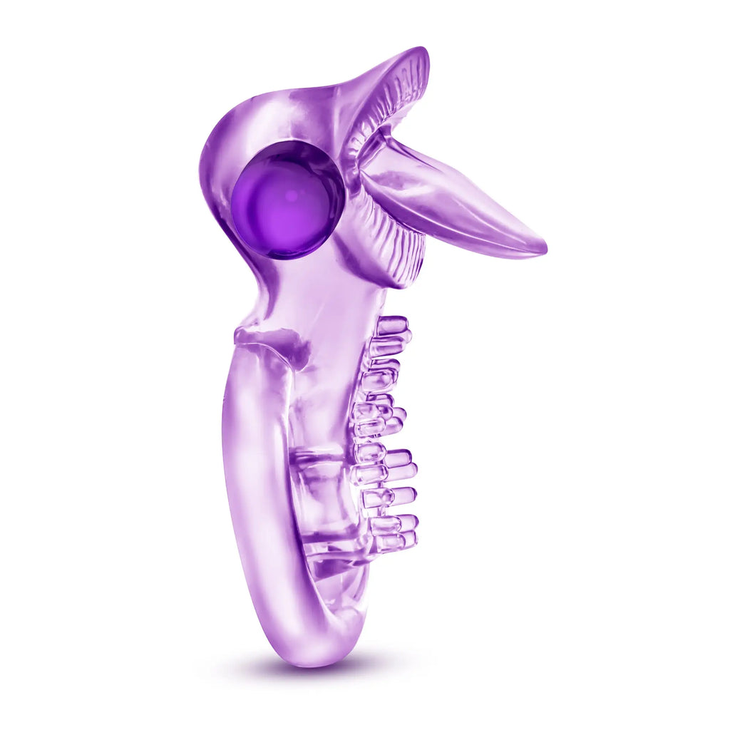 Purple translucent silicone duck-shaped vibrator with glossy finish and textured ridges from play with me lick it cock ring
