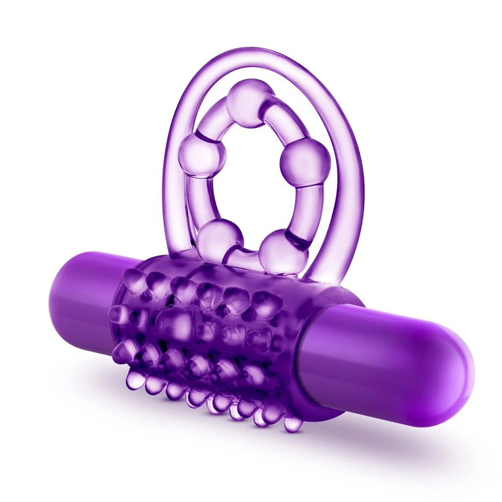Purple translucent silicone vibrating double strap cock ring with textured bumpy surface and clear plastic loop