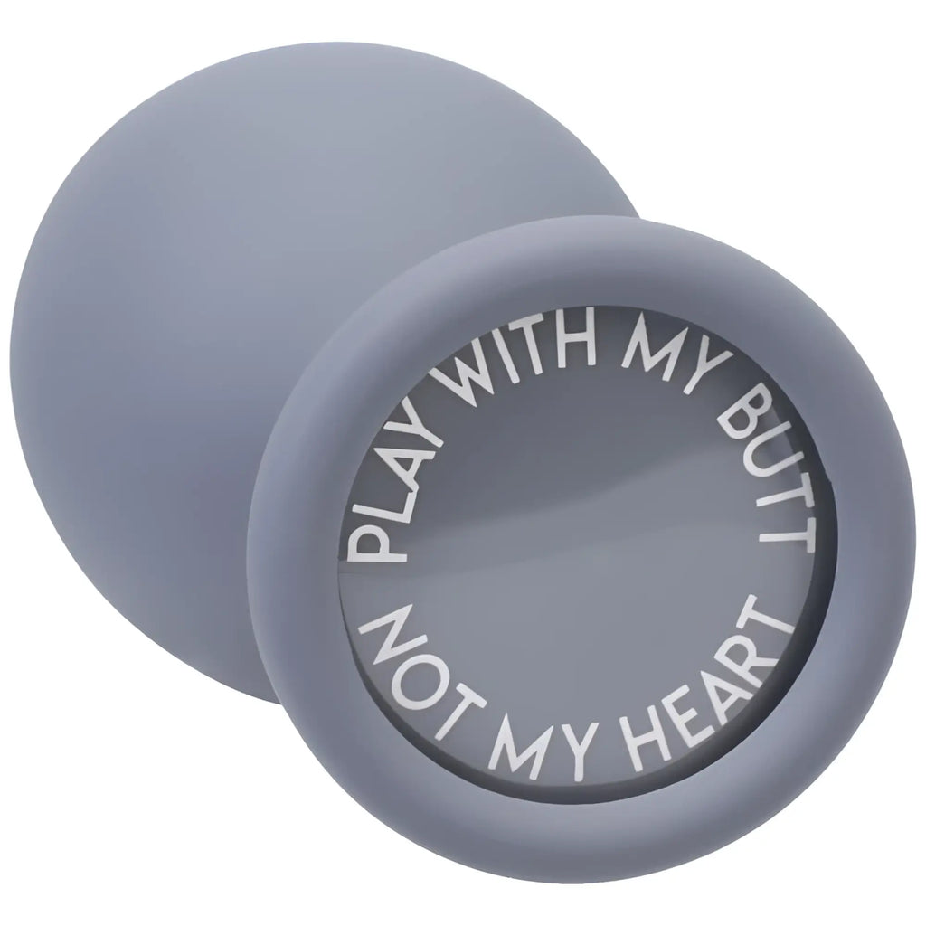 Gray silicone circular butt plug from a-play silicone anal trainer set 3 pc grey with white engraved text play with my butt not my heart