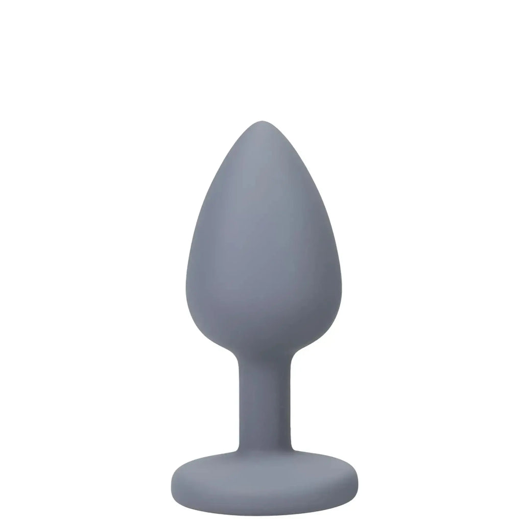 A sleek matte gray silicone butt plug with smooth teardrop head and rounded base from a-play silicone anal trainer set