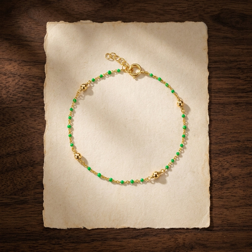 Sterling Silver Beaded Bracelet with Light Green Details