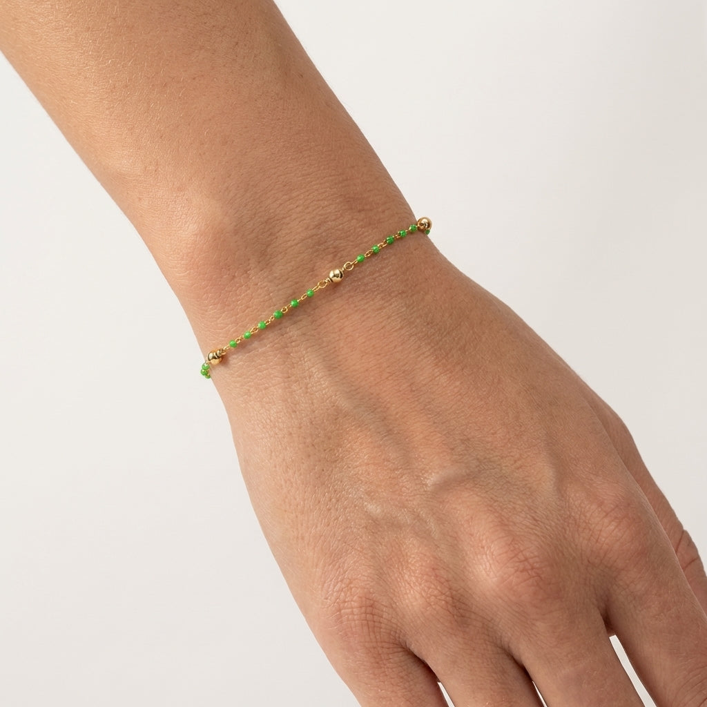 Sterling Silver Beaded Bracelet with Light Green Details