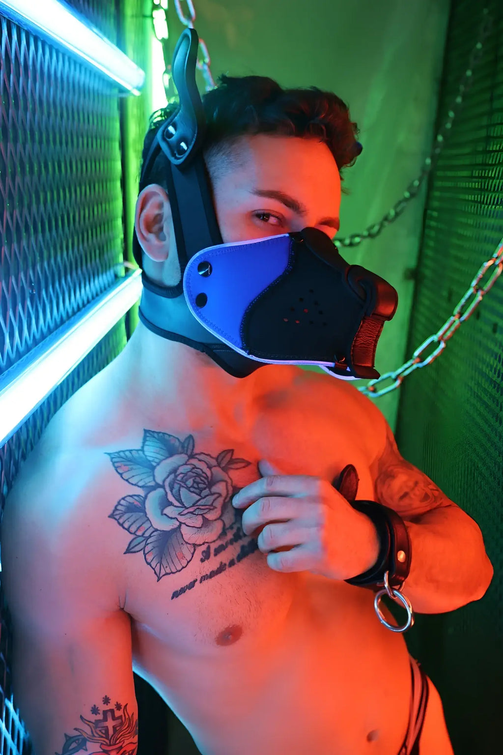 Black and blue leather Poundtown Pup Mask 2.0 with adjustable straps and metal hardware for secure fit