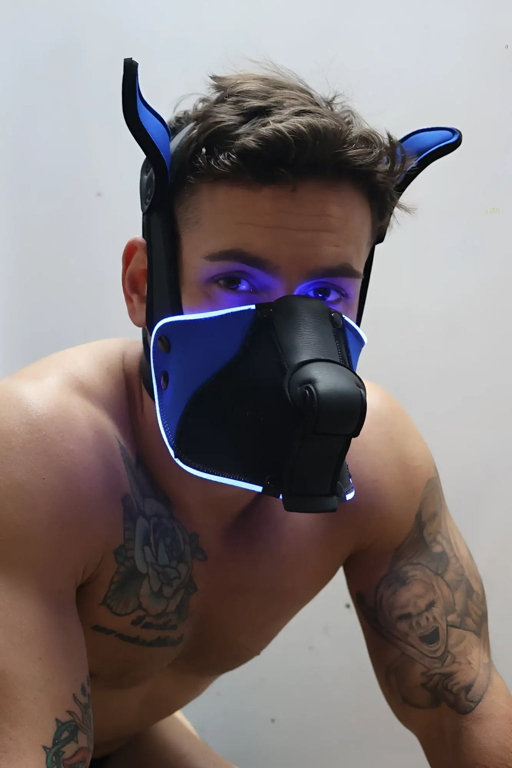 Blue and black leather dog mask poundtown pup mask 2.0 with glowing led trim for nighttime use