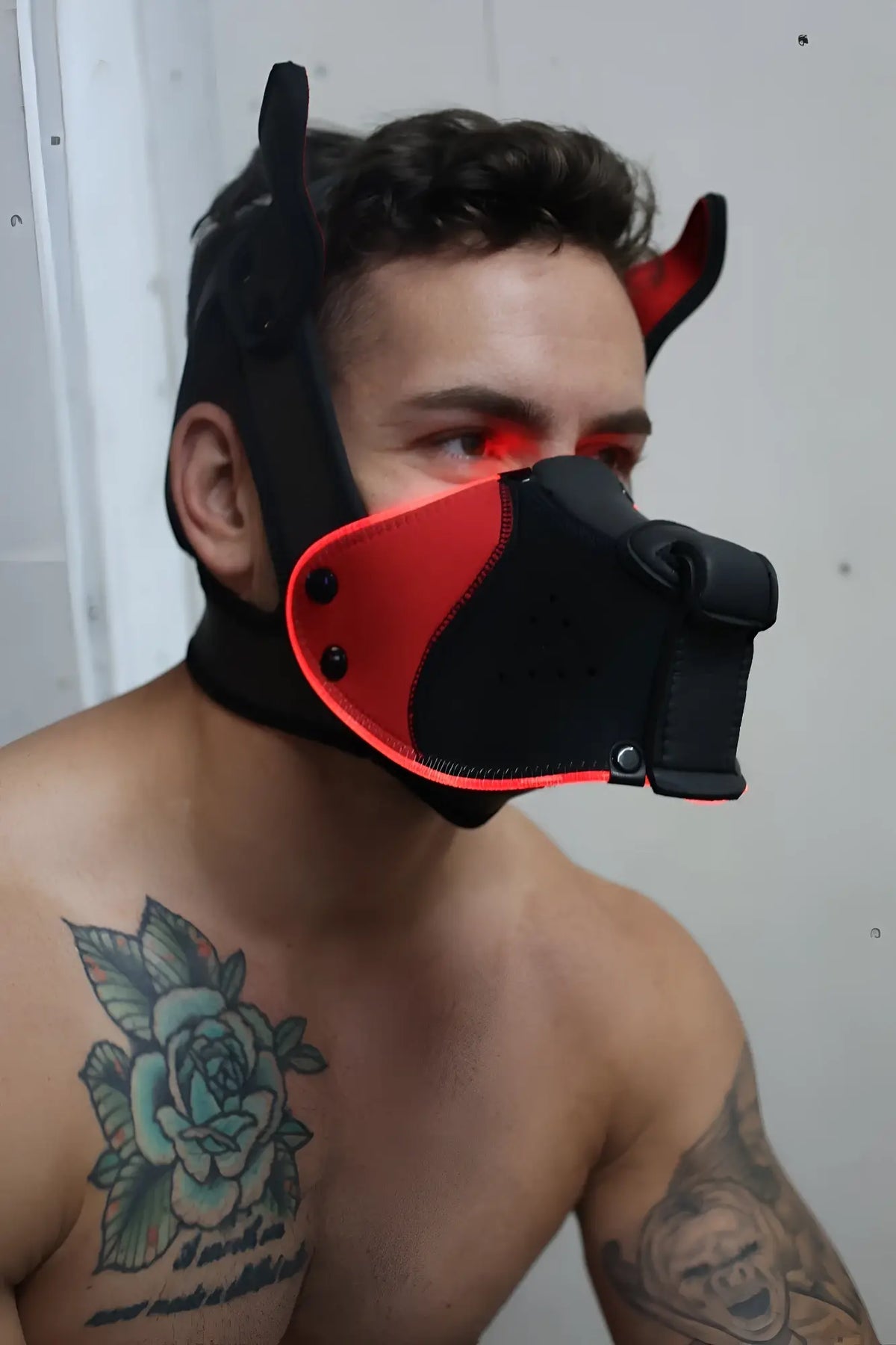 Black and red devil-themed poundtown pup mask 2.0 with adjustable straps for comfortable wear