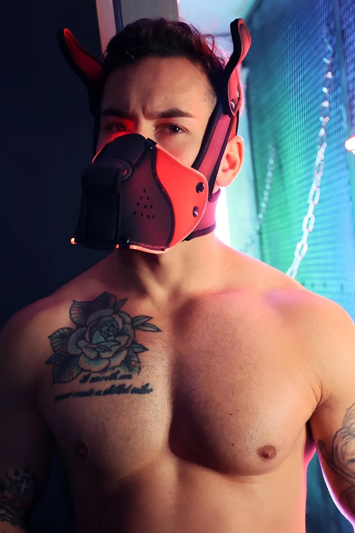 Red and black leather dog mask with pointed ears designed for face play in poundtown pup mask 2.0 red edition