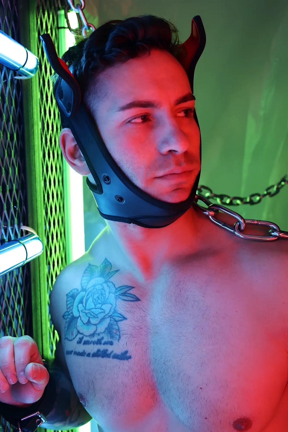 Black leather headpiece with red devil horns from poundtown pup mask 2.0 for costume or roleplay use