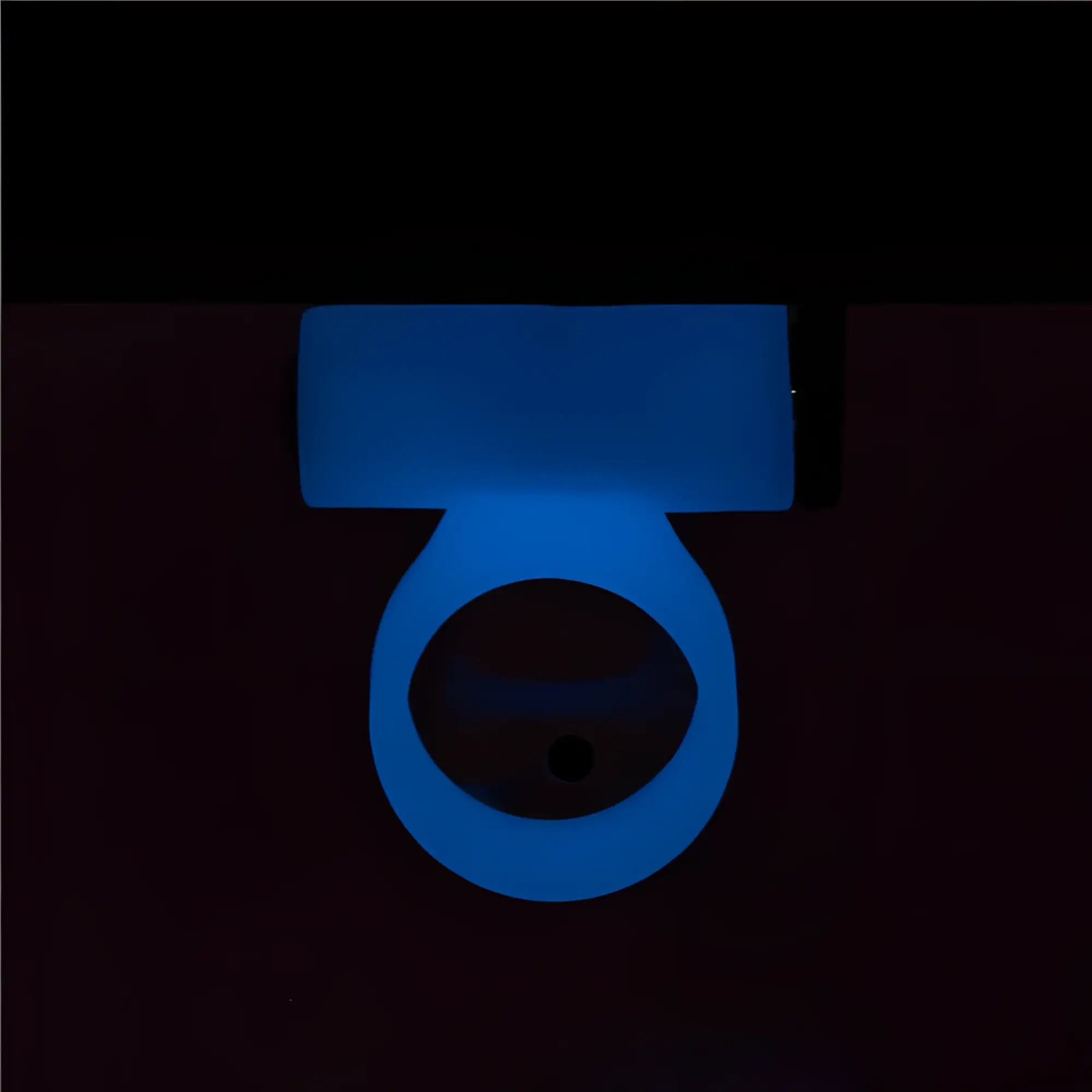 Blue glowing powerbullet power bullet cosmic cock ring stand with circular base and rectangular top section glow in the dark