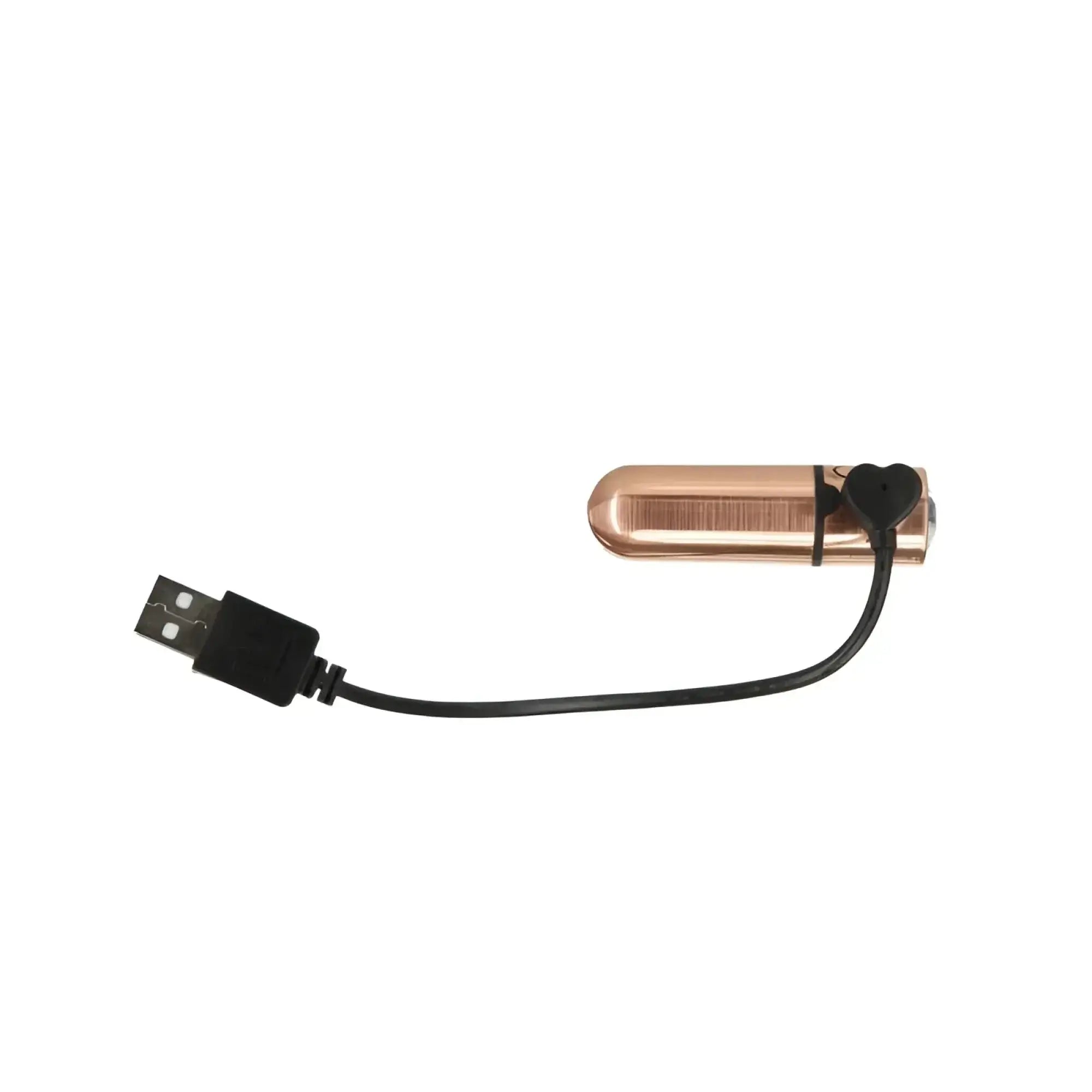 Rose gold cylindrical PowerBullet First Class 6cm rechargeable device with black heart-shaped clip and USB cable attached