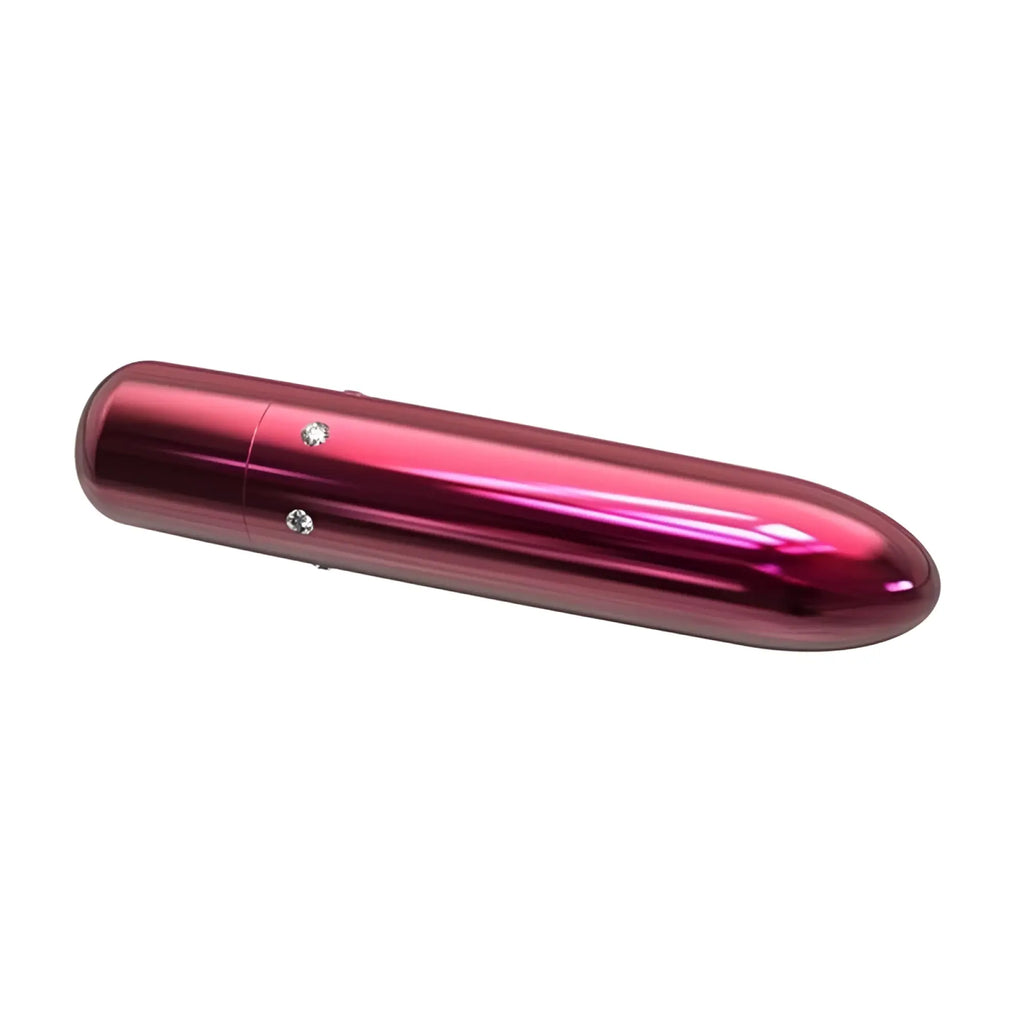 PowerBullet Pretty Point 4in power bullet pink is a sleek metallic pink cylindrical device with two clear gemstones