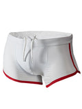 White pride vince trunk swim trunks with red trim and drawstring waistband for beach and pool use