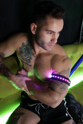 Prismaglow armband purple led light-up armband worn on a manâ€™s upper arm for visibility and style