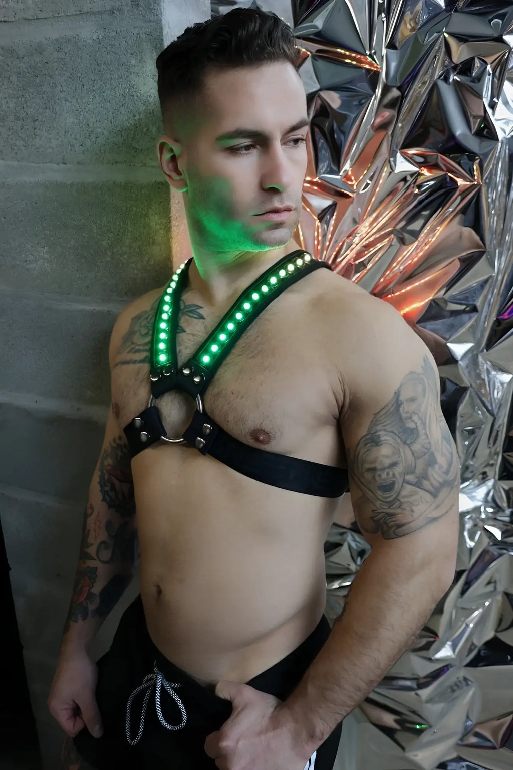 Prismaglow cross harness with green led lighting black straps and metal hardware for adjustable fit
