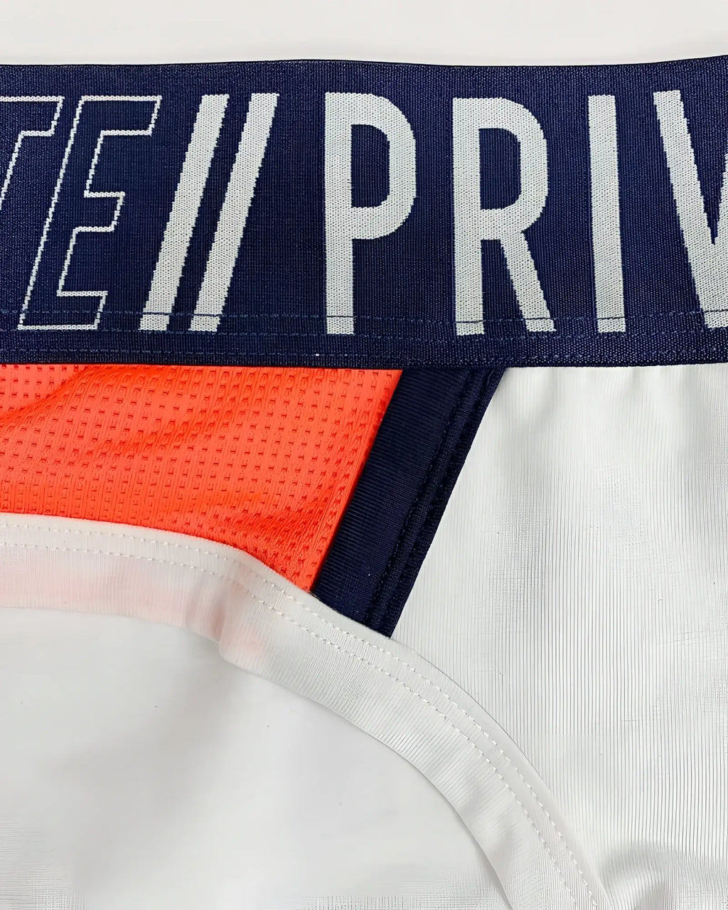 Private structure baut4388 athlete mini briefs in white with navy blue and bold orange mesh side panel for athletic wear