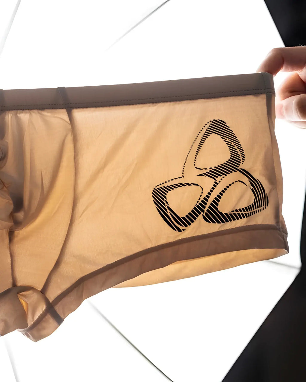 Private Structure BRUT4390 bare hipster tan mesh briefs with black geometric logo on the front in nude color