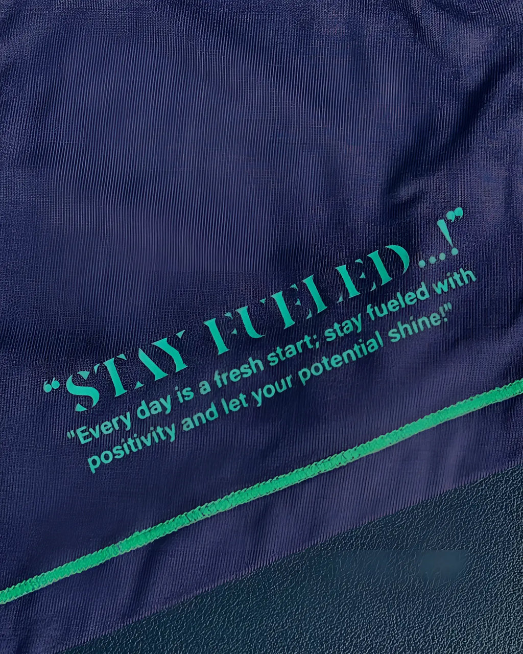 Navy blue cotton t-shirt from Private Structure with teal embroidered text and matching seam detailing