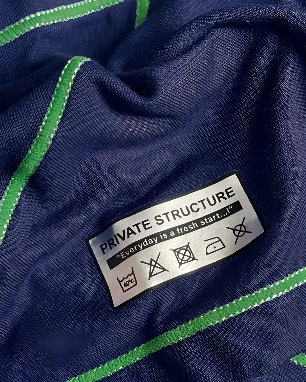 Navy blue ribbed knit private structure epus4570 prime elysian hipster with vibrant green stitched trim and care label