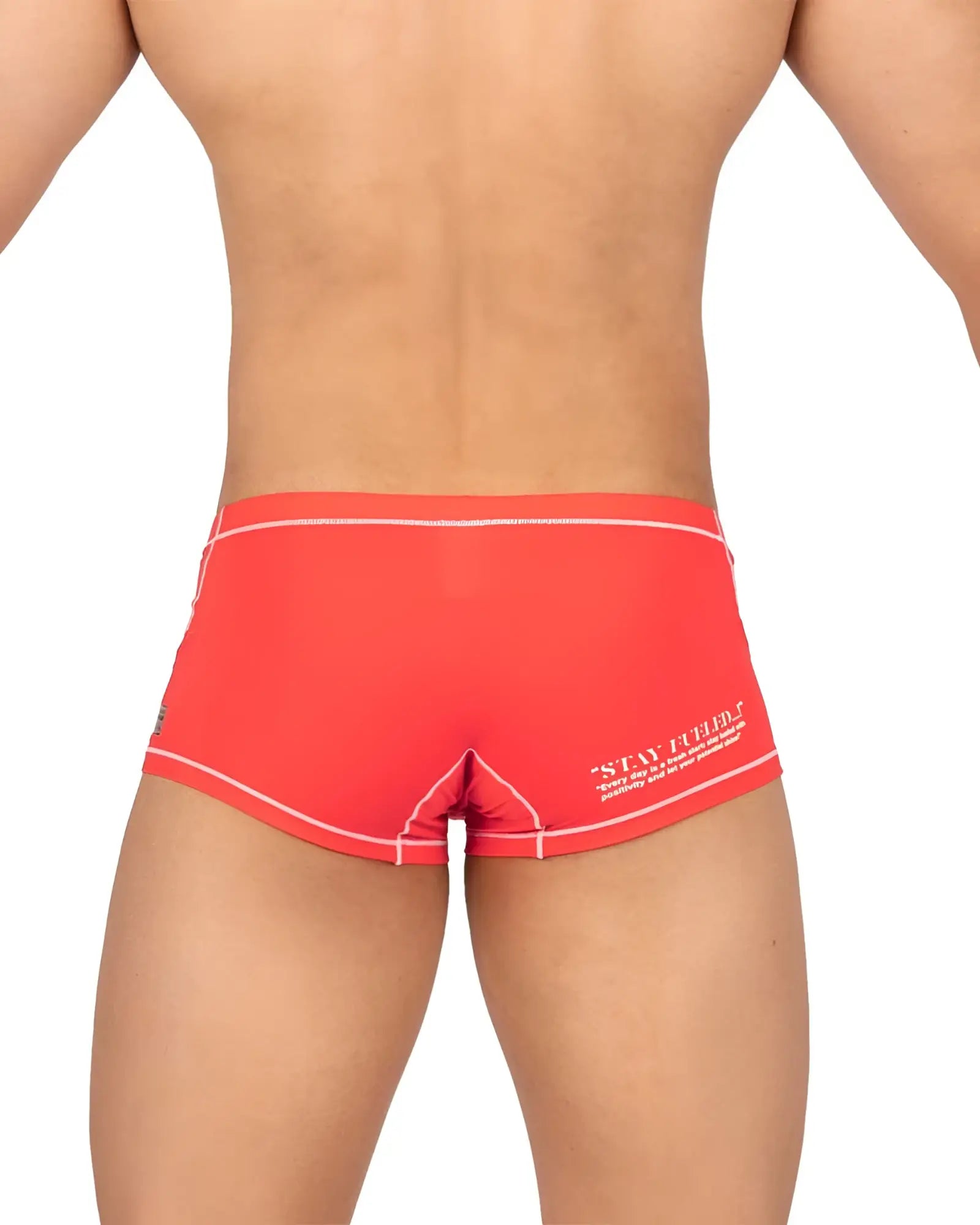 Back side of bright red private structure epus4570 prime elysian hipster swim trunks with white trim and stay fueled slogan