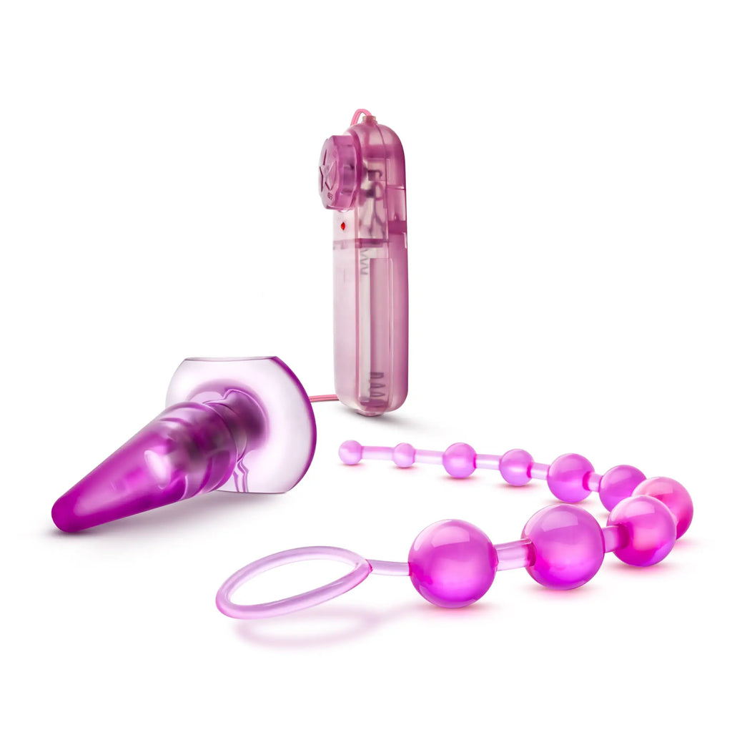 Pink translucent plastic vibrating anal butt plug with attached beaded chain and remote control in quickie kit