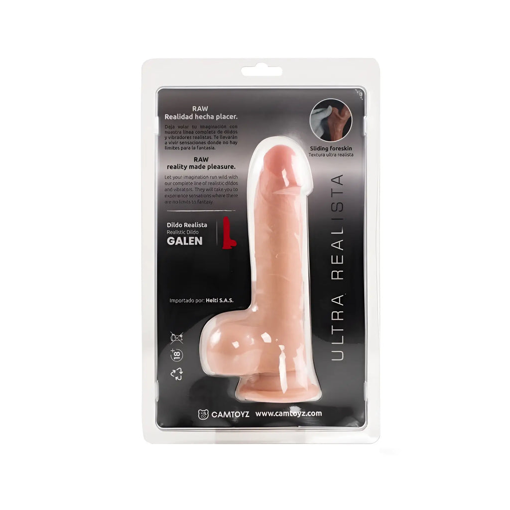Pink silicone realistic dildo with clitoral stimulator in clear packaging featuring black and white RAW Pigly branding