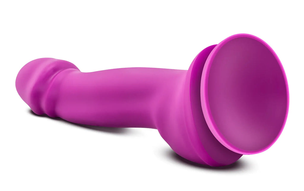Vibrant purple silicone suction cup dildo from real nude sumo violet designed for hands-free use