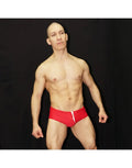 Red Brazilian sunga swimwear by Arroyman featuring a snug fit and minimal coverage modeled by a male model.