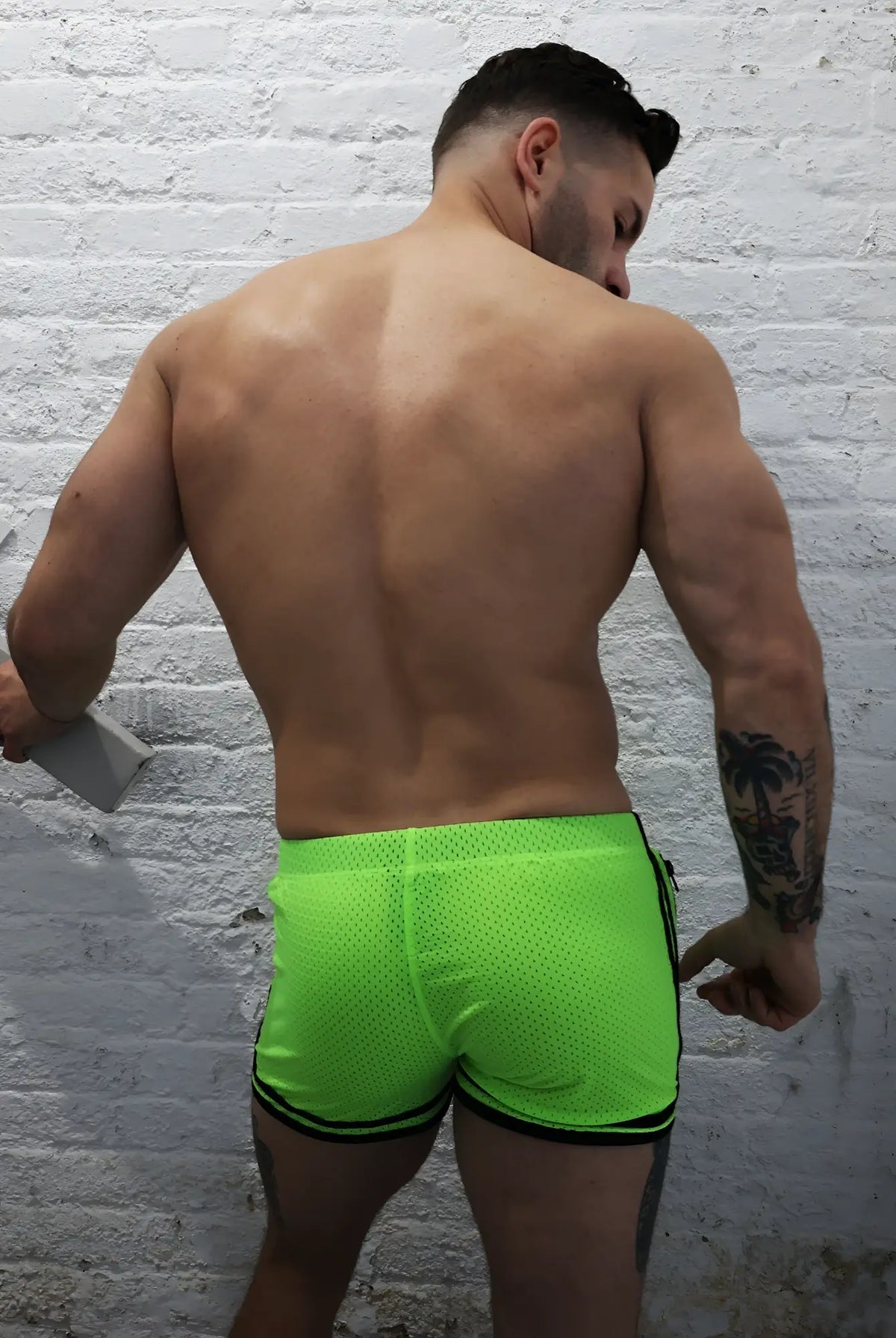 Neon green remix circuit shorts 2.0 mesh athletic shorts with black trim for lightweight activewear
