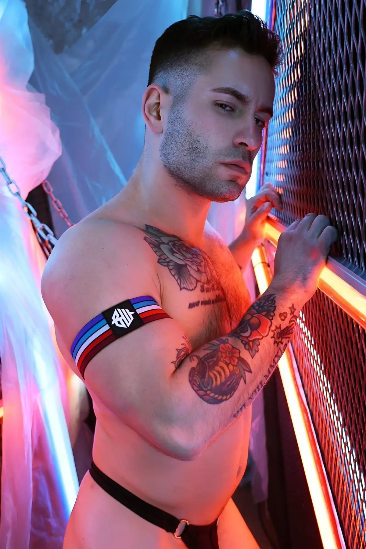 Black retro remix armband with red white and blue stripes and a silver logo for stylish wristwear