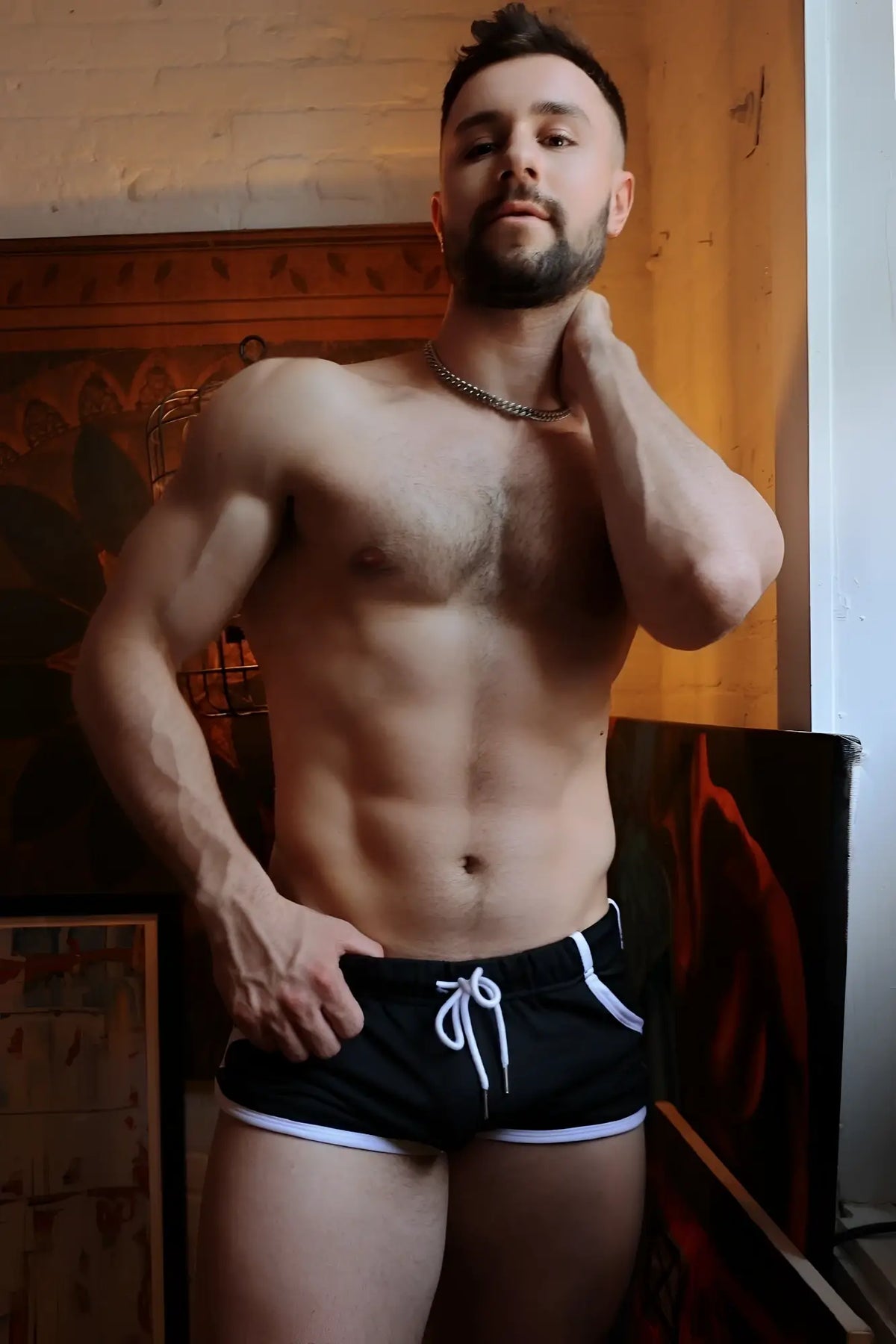 Black athletic shorts with white trim and drawstring lightweight fabric perfect for retro remix shorts design