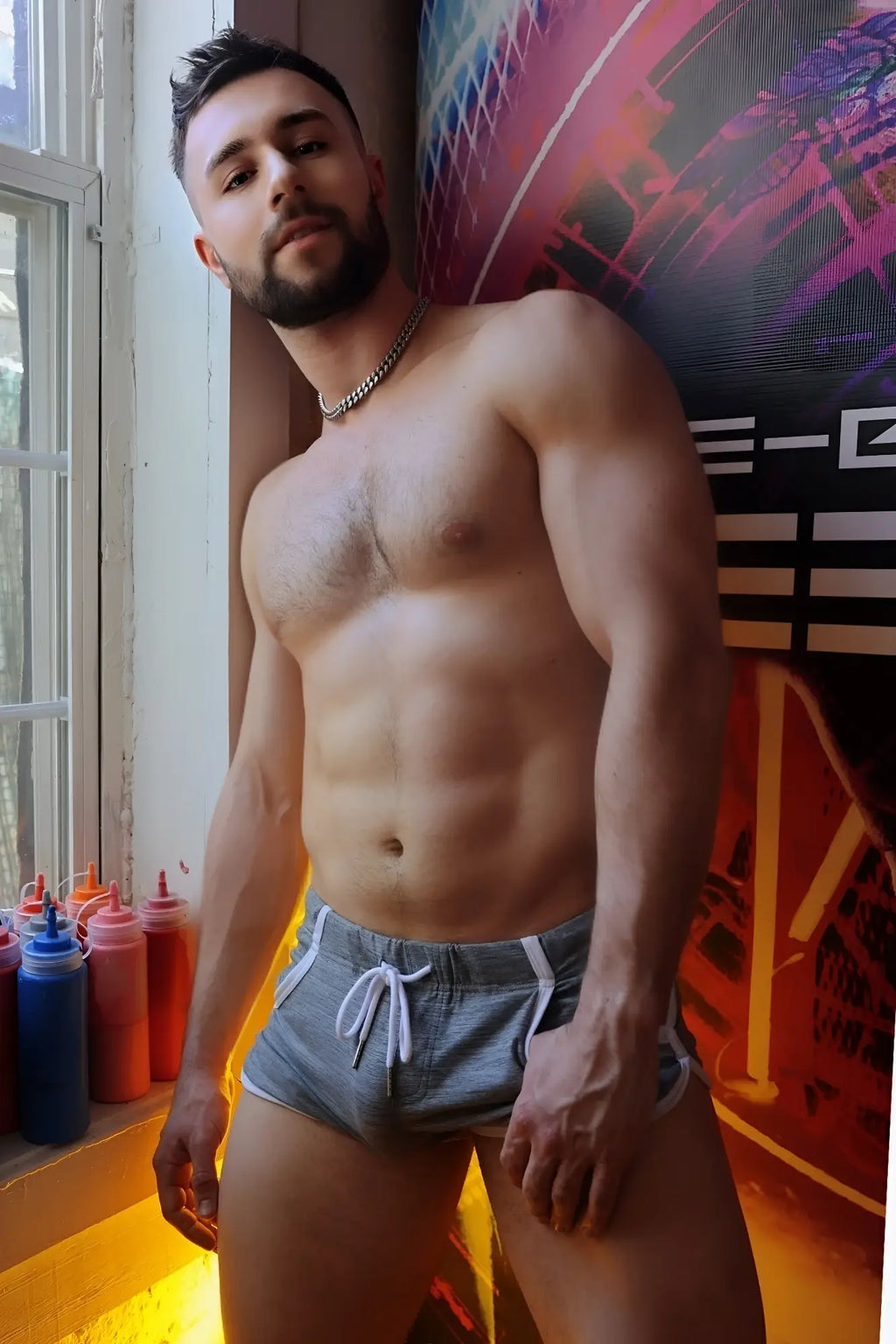 Gray athletic retro remix shorts with white drawstring and trim made from breathable fabric for active wear