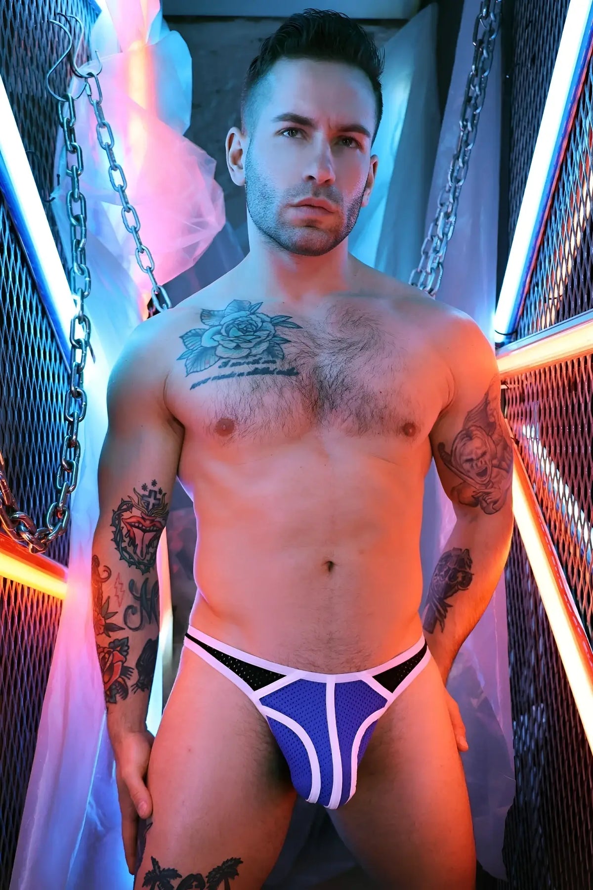 Retro remix thong featuring blue and white patterned briefs with black mesh accents front view