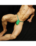 Green ribbed G-string thong underwear by Arroyman featuring a bulge pouch and minimal coverage shown on a model.