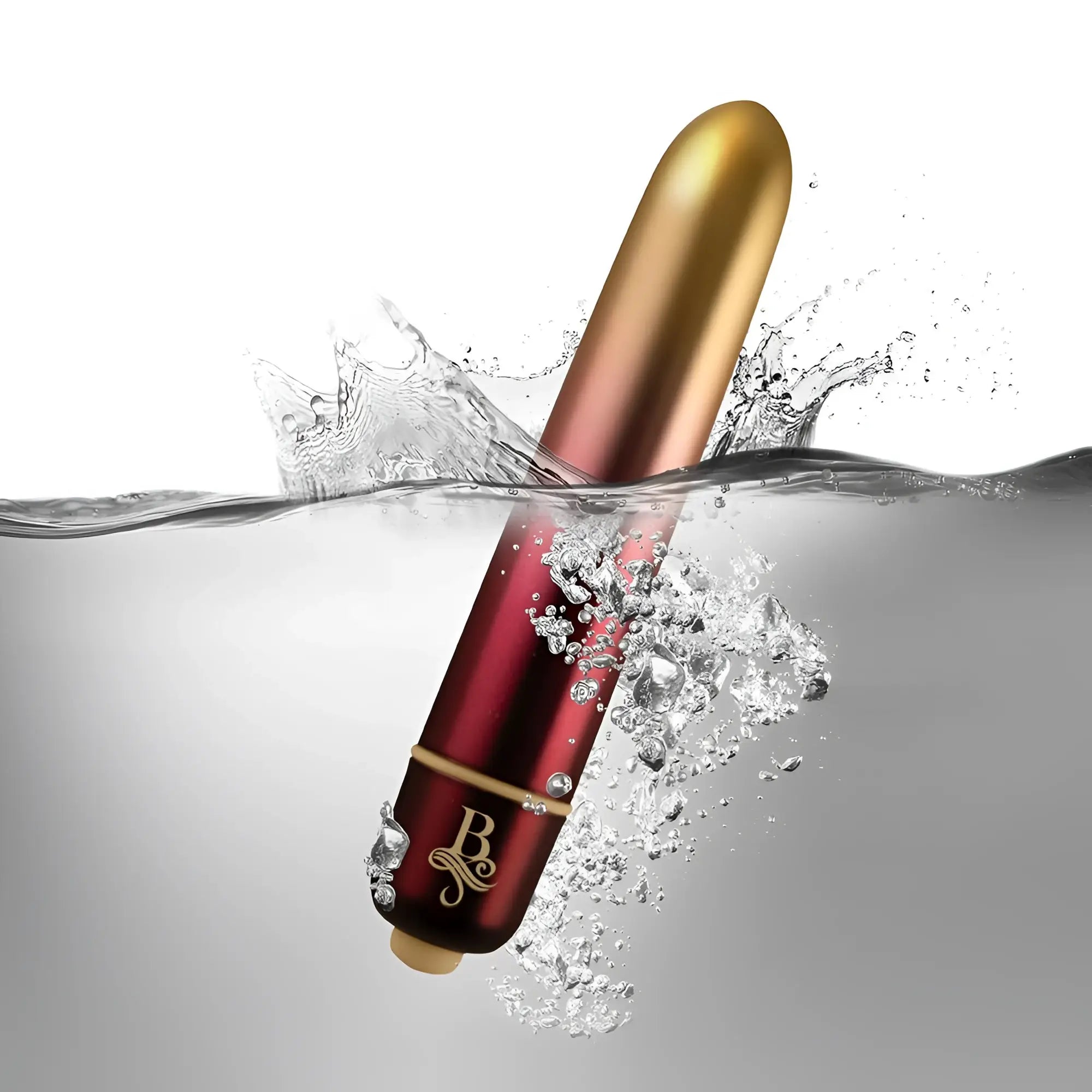 A sleek two-toned red and gold metallic rocks off boudoir debutante bullet vibrator with an elegant b logo near the base