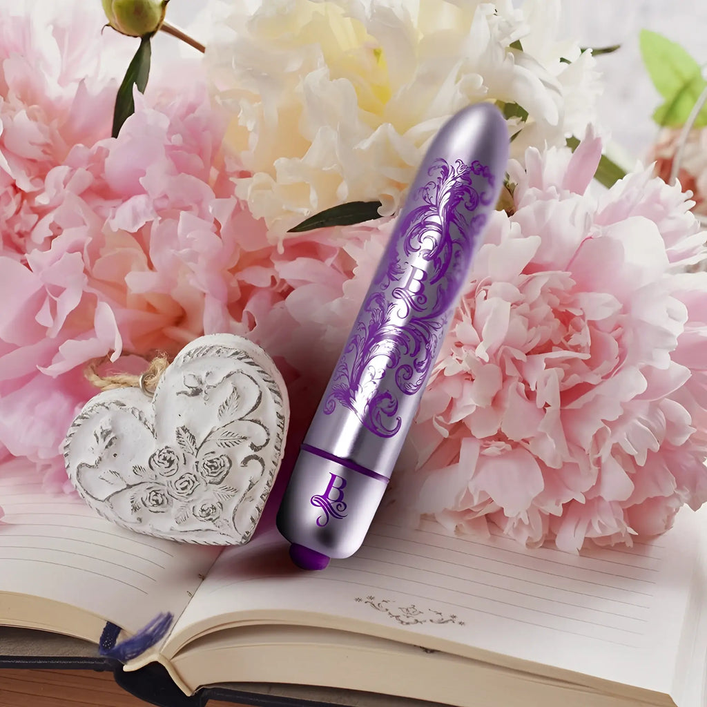 Purple and silver ornate vibrator with floral designs in rocks off boudoir duke of swoon bullet style