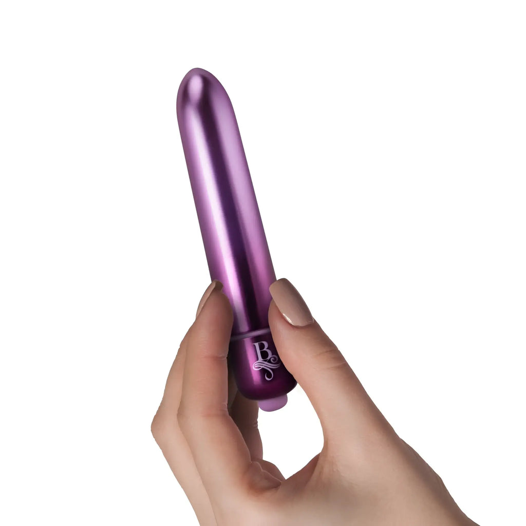 Purple metallic rocks off boudoir parlour prince bullet vibrator with sleek smooth finish and engraved logo near base