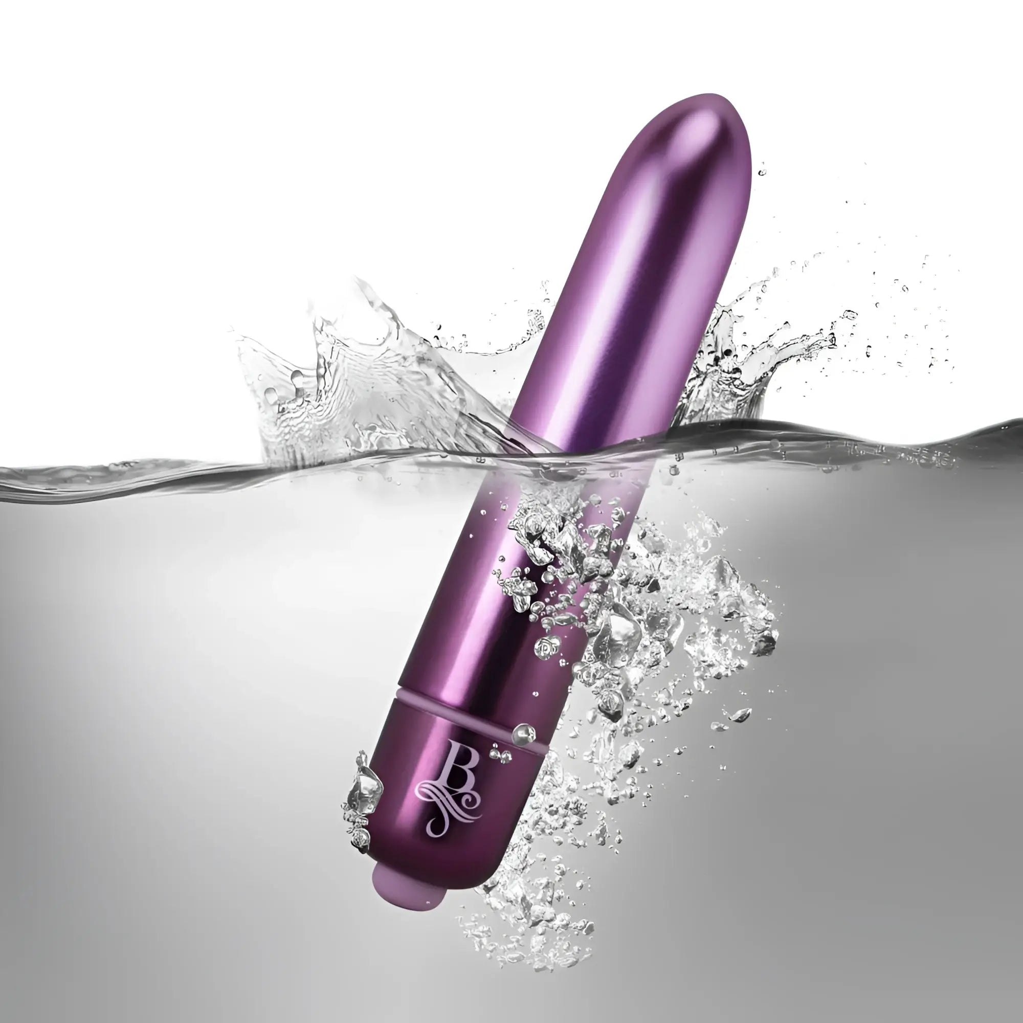 Purple metallic cylindrical vibrator with smooth surface and engraved logo near base rocks off boudoir parlour prince bullet