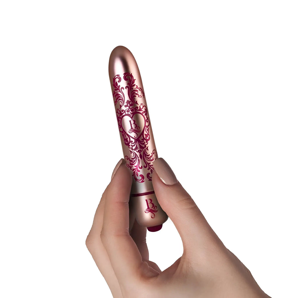 Rose gold rocks off boudoir promenade bullet vibrator with ornate damask engravings and heart shaped logo