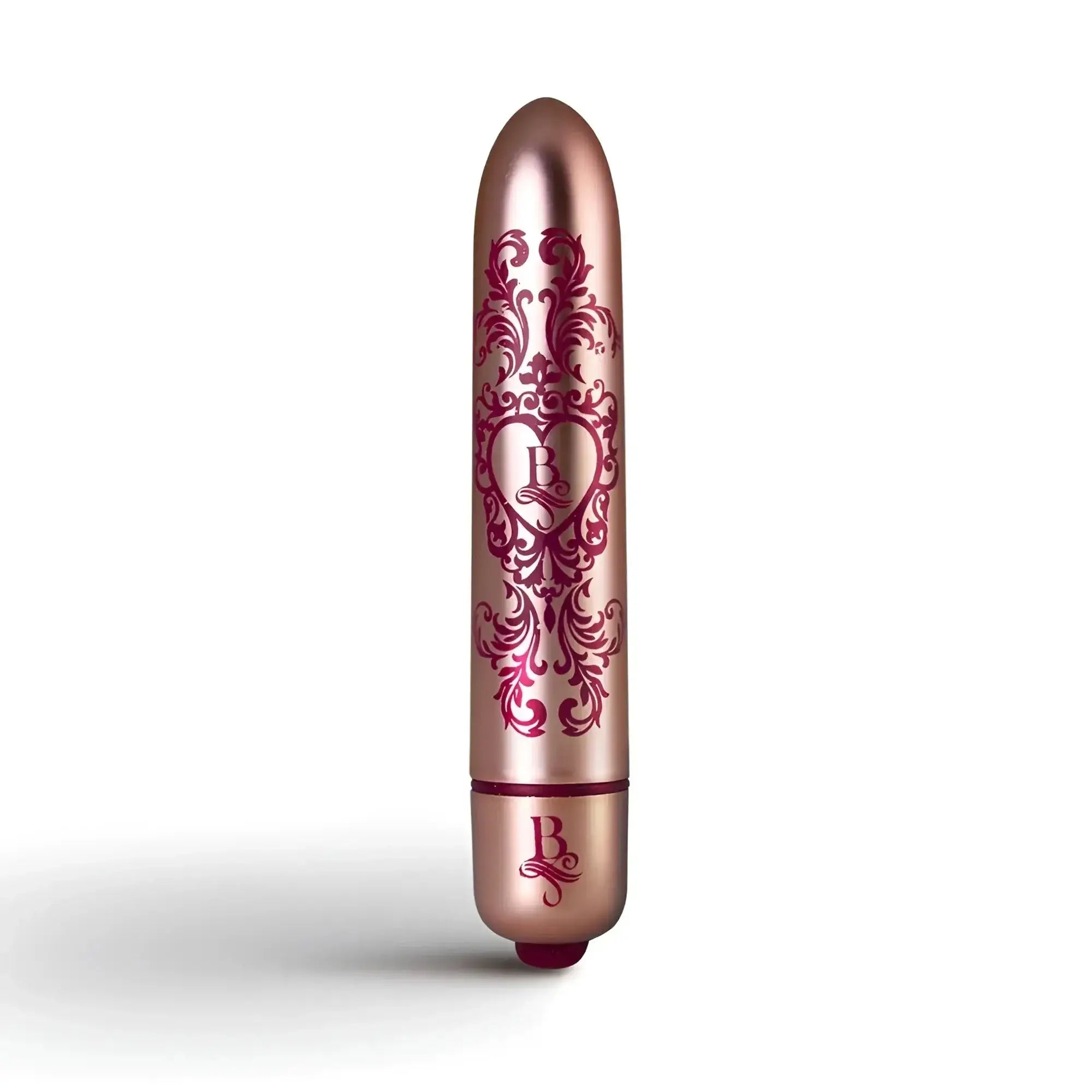 Rose gold cylindrical vibrator rocks off boudoir promenade bullet with intricate burgundy floral and heart design.