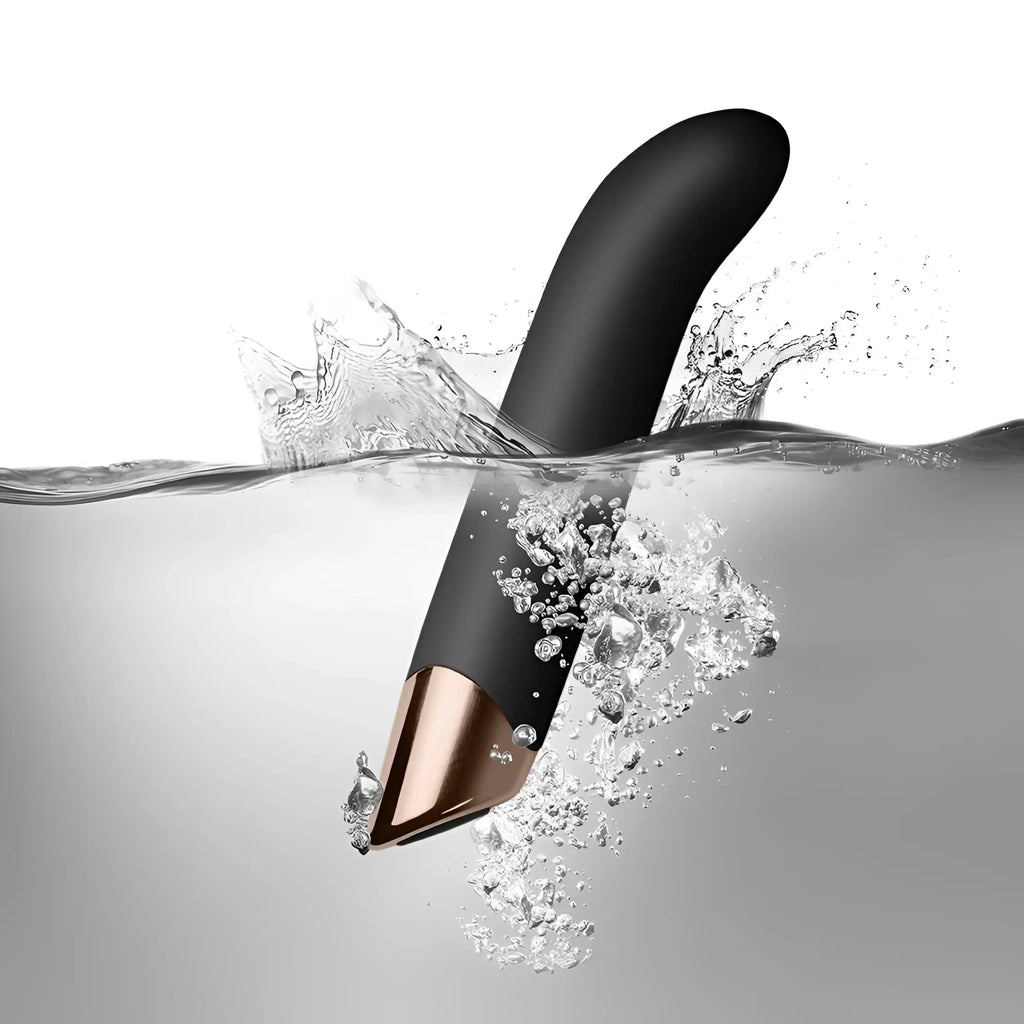 Black and rose gold silicone vibrato with curved design from rocks off chaiamo g black product line