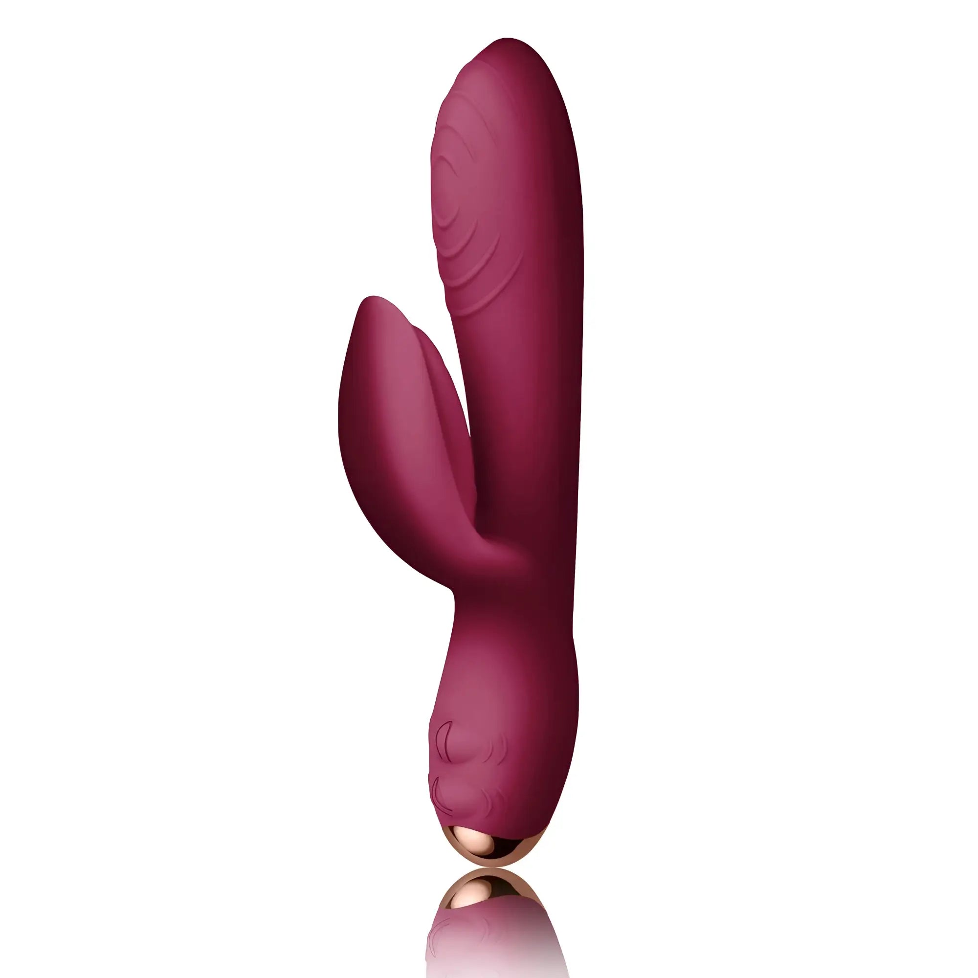 A sleek deep burgundy silicone rocks off every girl rabbit vibrator with rose gold base and textured ridges