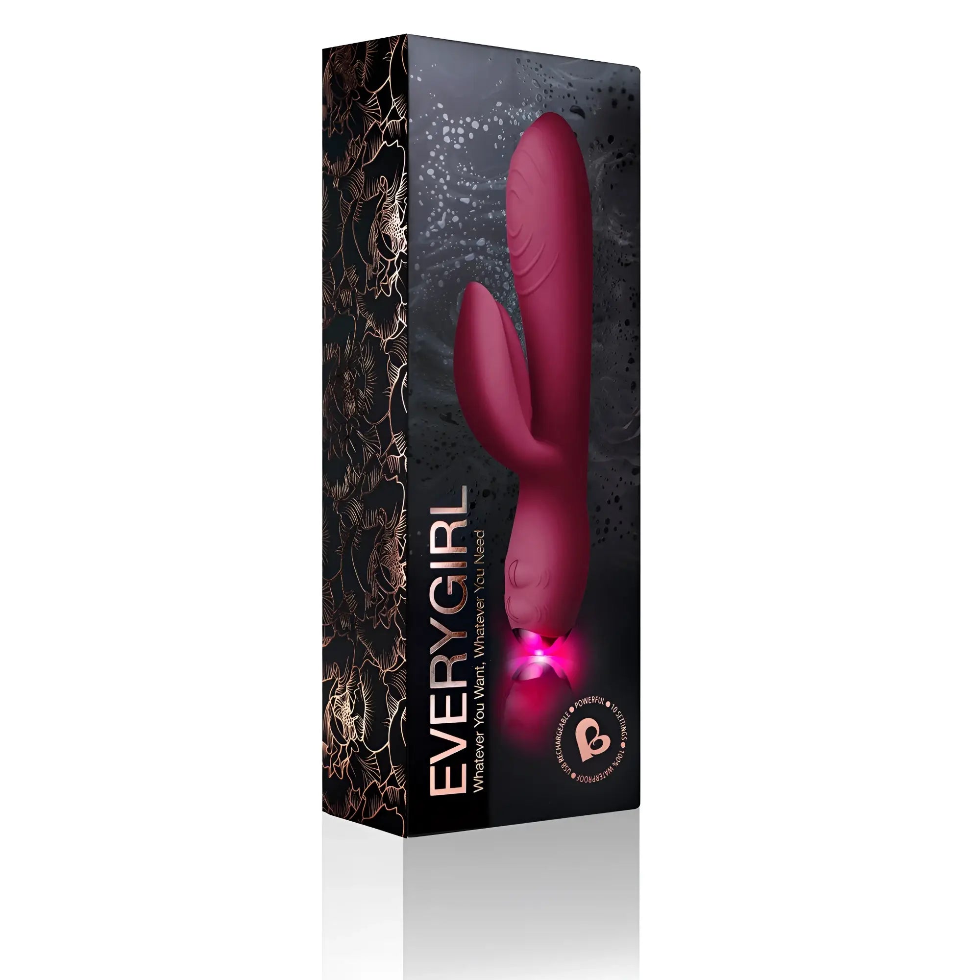 A sleek magenta silicone Rocks Off Every Girl rabbit vibrator with a glowing pink light at its base