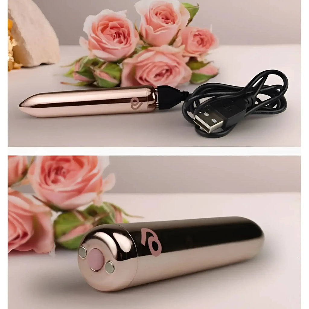 Rose gold metallic cylindrical rocks off golden rose rechargeable bullet vibrator with black usb charging cable.